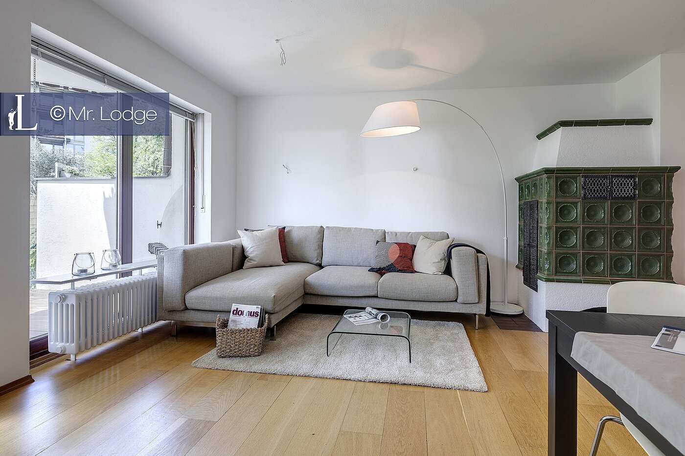 フラット 部屋数 2 部屋 | München-Harlaching | 1704ML6 | Wohnzimmer mit Kachelofen
