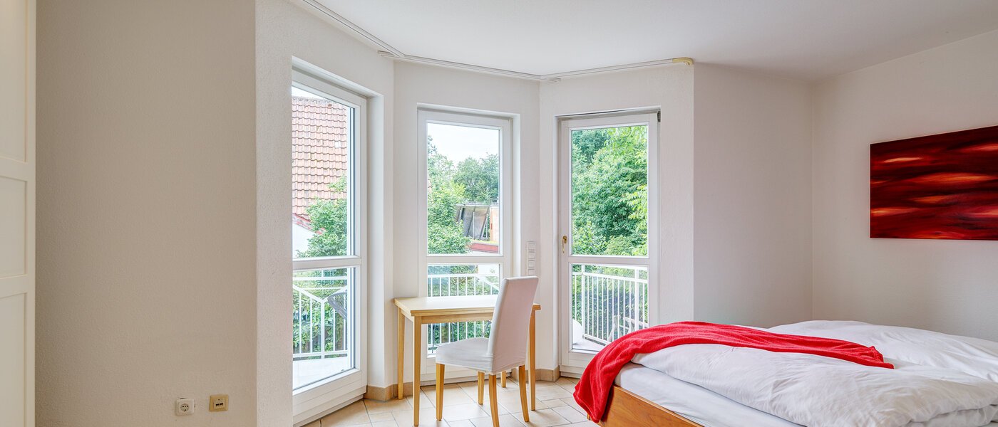 セミ・デタッチド・ハウス（一戸建てを二つに分けた家屋） Gauting 02 1. 寝室 12610