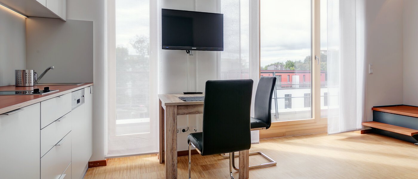 複層－回廊住宅 Unterschleißheim 04 リビングルーム 9678