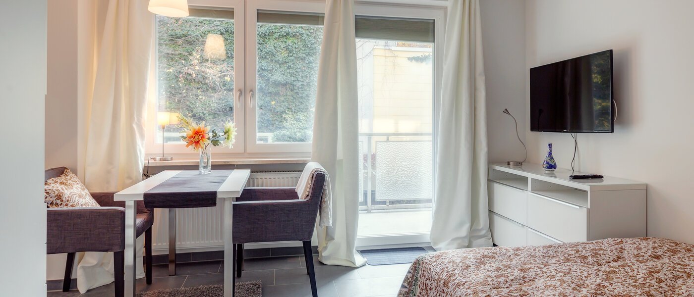 アパルトマン München Schwabing (rechts der Leopoldstraße) 02 リビングルーム 9736