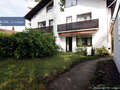 セミ・デタッチド・ハウス（一戸建てを二つに分けた家屋） München Trudering 01 庭 1464