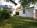 セミ・デタッチド・ハウス（一戸建てを二つに分けた家屋） München Trudering 03 庭 1464